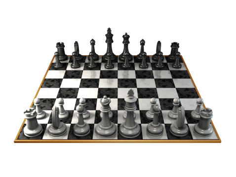 A stylish chessboard with ivory chess pieces... With clipping path... (Please note that clipping path will be available in the largest file size purchase.)