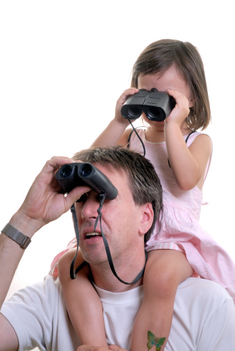 Daughter sits on top of father's shoulders while they both look through binoculars. Little girl has generic play butterfly tattoo on left leg.You may be interested in other images of this father and daughter: