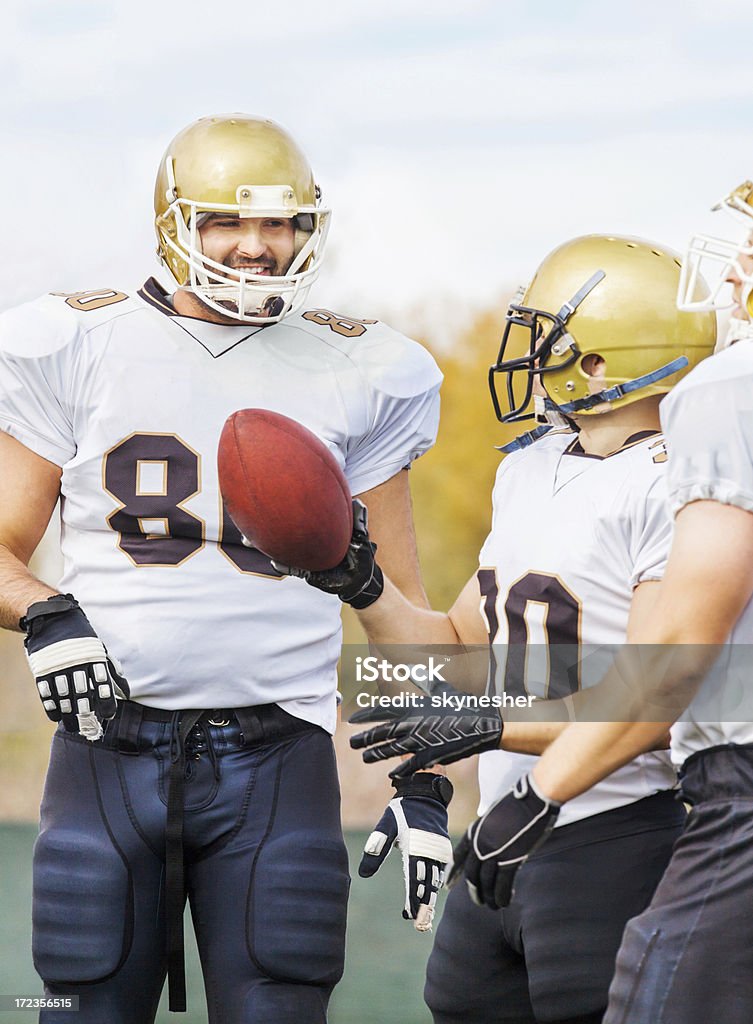 Joueurs de football américain universitaire. - Photo de Adulte libre de droits