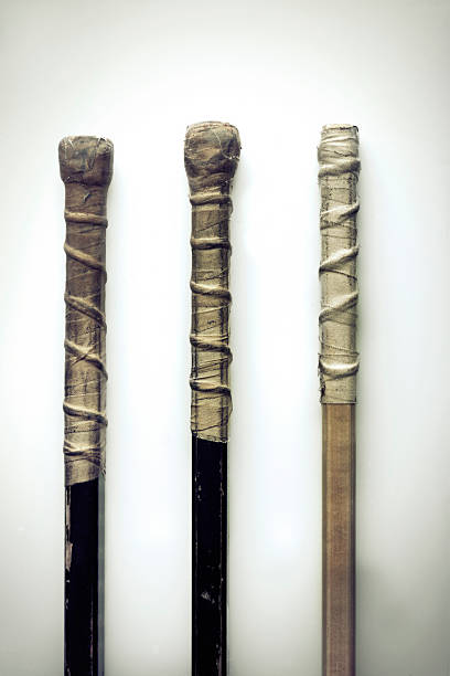 istock Old hockey sticks on white 172358078