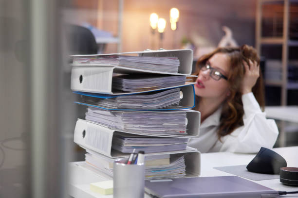istock Overworked Business Woman With Stack Or Pile 1723585712