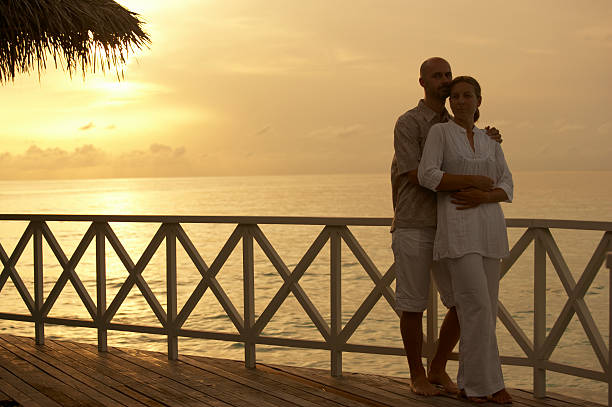 istock young couple in sunset 172359459