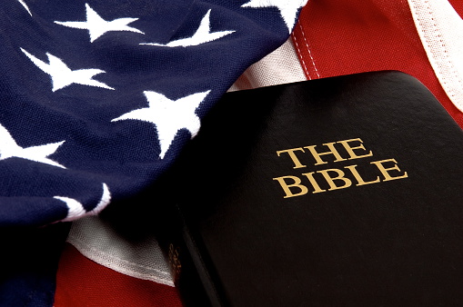 The Bible resting on an American Flag
