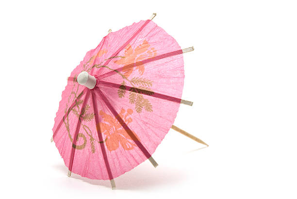 rosa carta ombrellino da cocktail - drink umbrella umbrella parasol drink foto e immagini stock