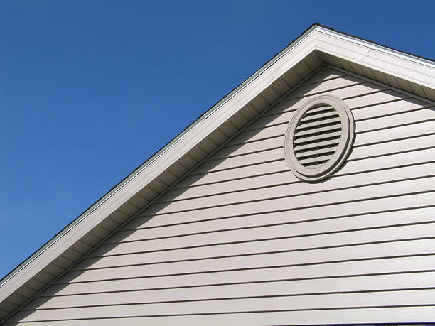 New Construction-House "Detail shot of roof gable on a newly constucted house showing attic ventilation panel.If possible, please let me know how or where you use this image." gable photos stock pictures, royalty-free photos & images