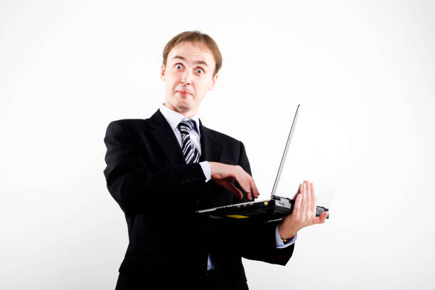 istock Businessman with laptop surprised 172360080
