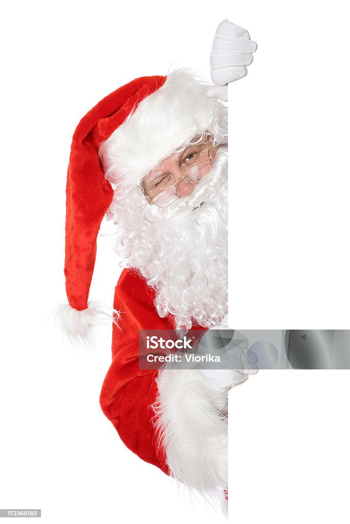 Santa with copyspace Santa holding a blank sign. Isolated on white. You can add extra white space with your text to the right side. Active Seniors Stock Photo