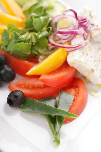 plate of vegetables with white cheese