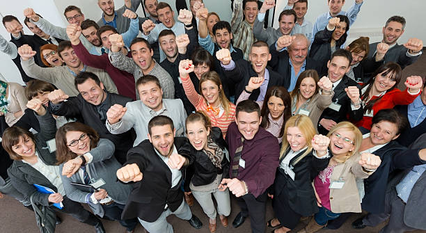 istock Business people holding fists up. 172360656