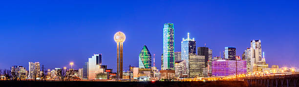 Panorama Dallas City Skyline at Night USA Panoramic view of the Dallas skyline at twilight, USA dallas texas photos stock pictures, royalty-free photos & images