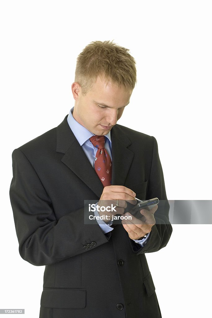 Jeune homme d'affaires avec palmtop - Photo de 20-24 ans libre de droits