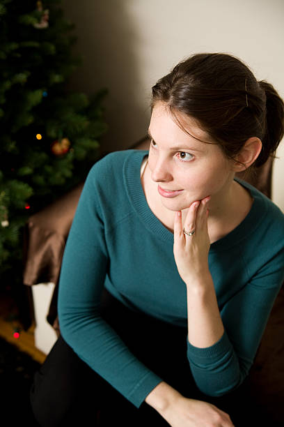 istock Christmas Tree and Young Woman 172362544