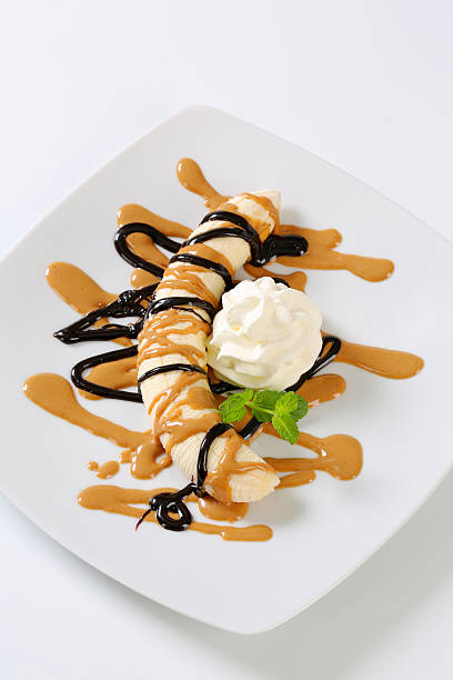 istock banana with whipped cream 172362676