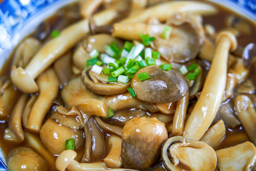 A delicious Chinese home-cooked dish, stir-fried mushrooms with soy sauce
