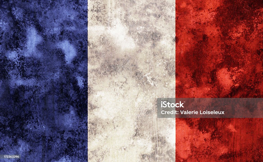 Old French flag French flag with dry mud. French Flag Stock Photo