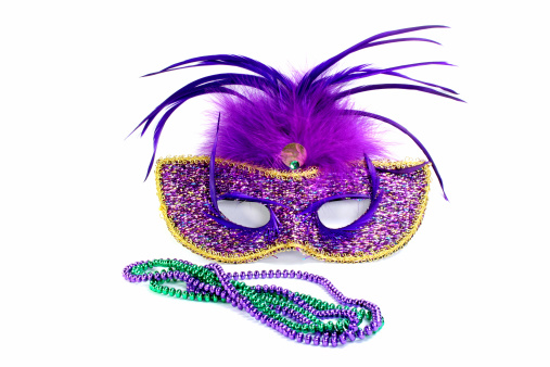 fancy dress mask Purple mask with purple and green beads.
