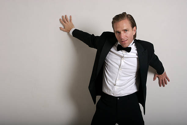 istock Man in Tuxedo Against the Wall 172363990