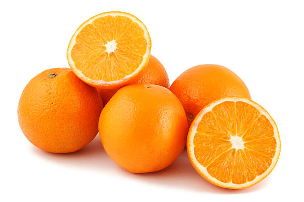 Close up studio shot of 5 oranges on white background