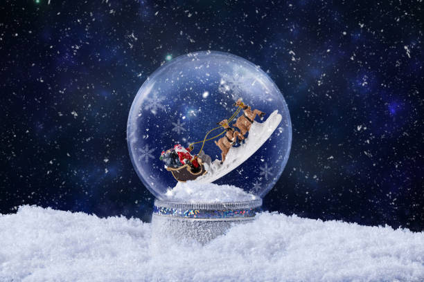 istock Christmas snow globe with Santa Claus ride on reindeer inside. 1723649517