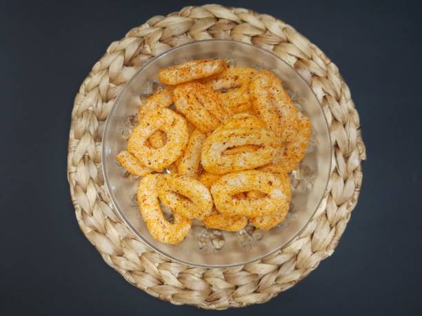 istock Spicy coin ring crackers mixed with chili powder 1723652144