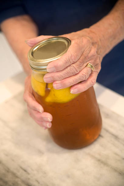 istock Elderly Women Trying to open a jar 172365351