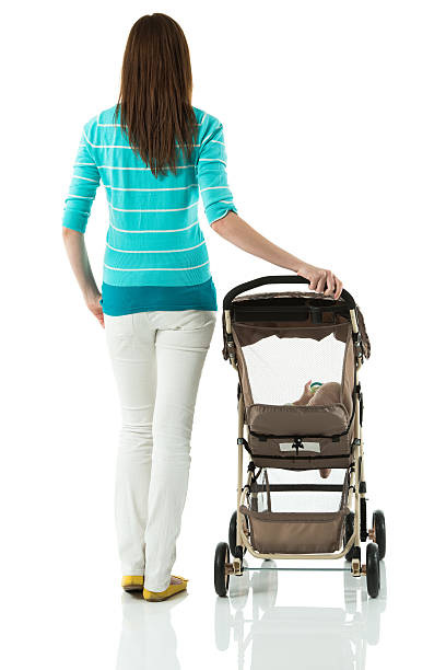 istock Young mother with baby in perambulator 172365898