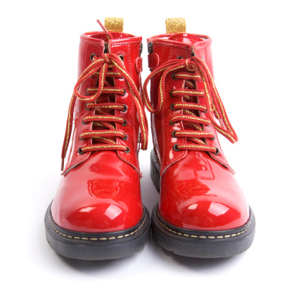 red shiny boots on white background