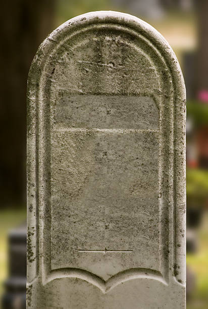 Tombstone #2 (w/ clipping path) Tombstone up-close with clipping path around it. crypts stock pictures, royalty-free photos & images