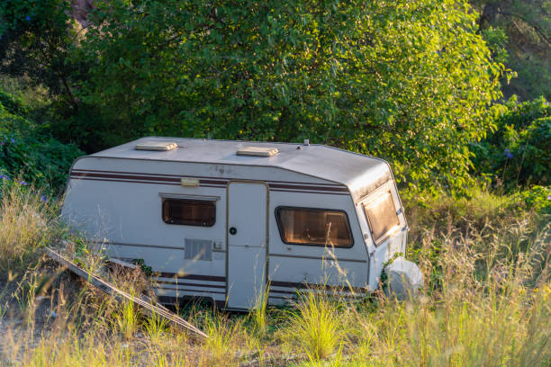 istock Old caravan abandoned in the field 1723680705