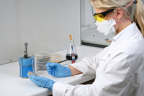 Female Laboratory worker at biological preparation.
