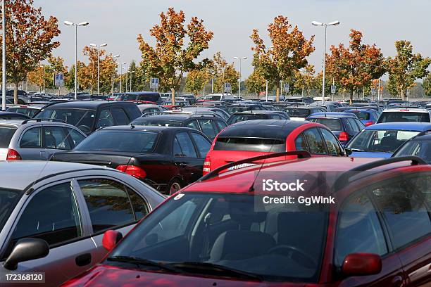 The Tops Of Many Rows Of Cars In A Parking Lot With Trees Stock Photo - Download Image Now