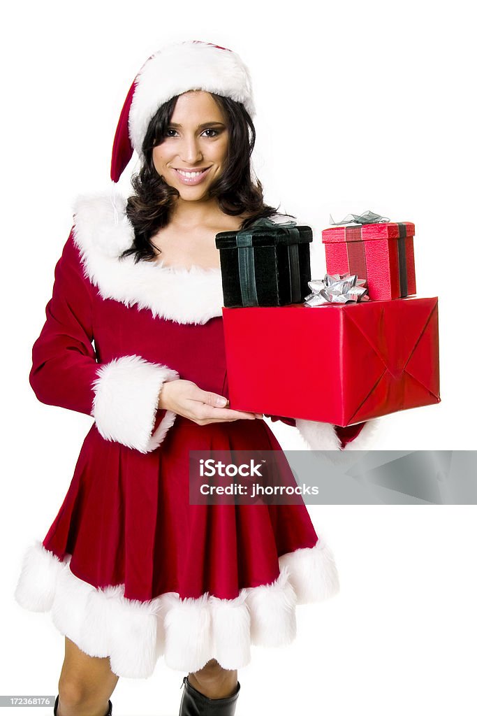 Miss Santa with Presents Photo of an attractive Miss Santa holding a stack of gift boxes... 20-29 Years Stock Photo