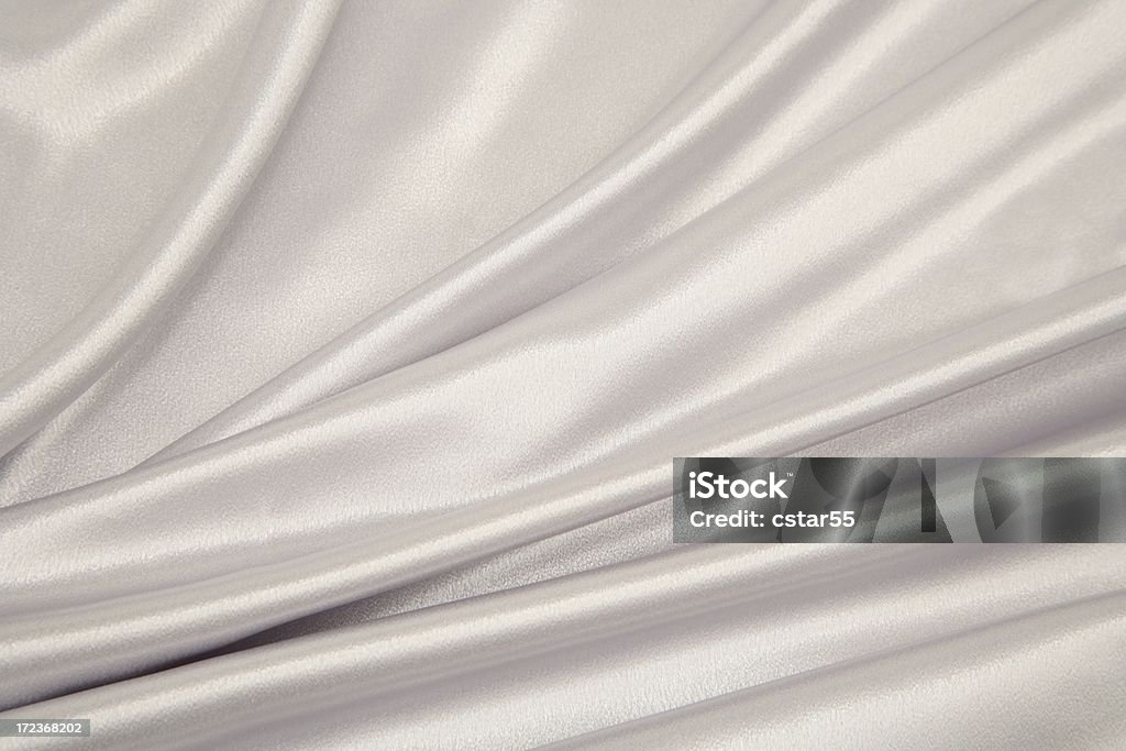 Серебряные и белые атласной Series со стрелками - Стоковые фото Атласная ткань роялти-фри