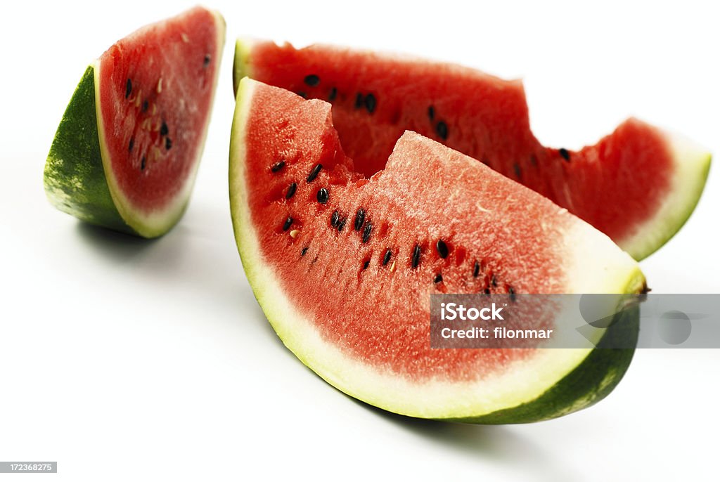 Melon slices Slices of ripe juicy watermelon - isolated on white background with soft shadow + clipping path Cut Out Stock Photo