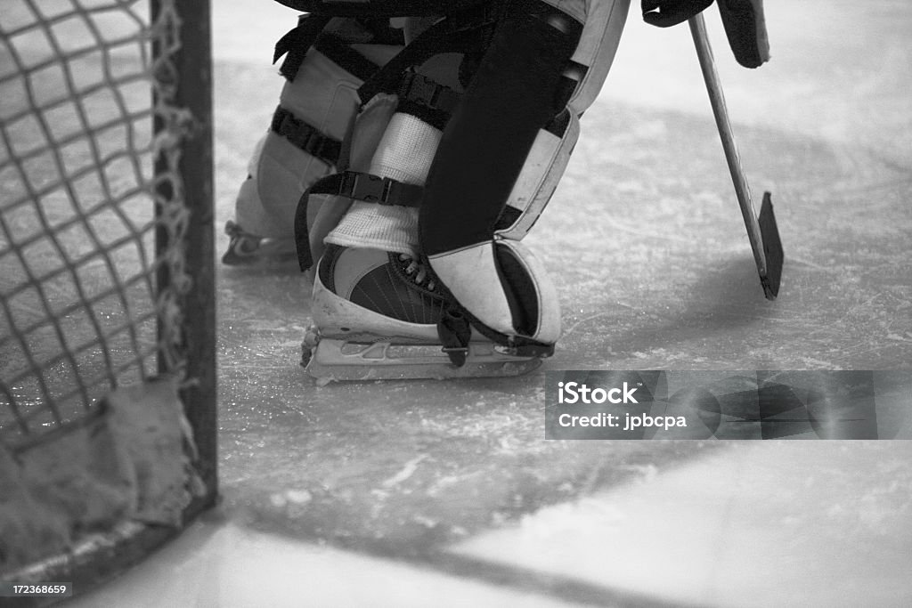 Gardien de but de hockey & noir blanc - Photo de Filet - Matériel de sport libre de droits