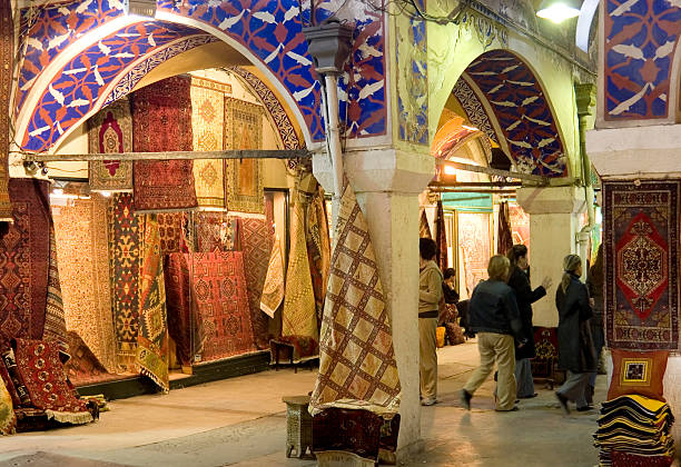 Grand Bazaar, Istanbul "Carpet shops in the Grand Bazaar, Istanbul. The bazaar contains 4000 shops and dates back to the 15th century." grand bazaar istanbul stock pictures, royalty-free photos & images