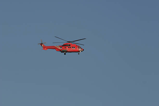 istock oil rig helicopter in flight 172369598