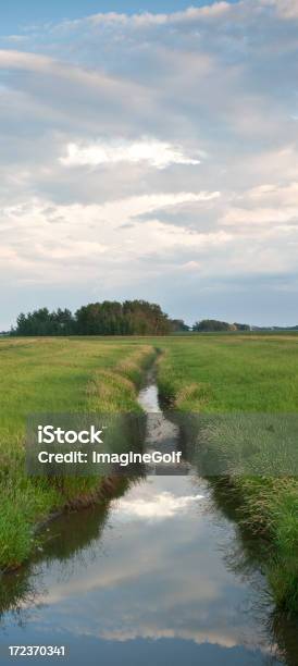 Man Made Irrigation Canal On The Plains Stock Photo - Download Image Now - Prairie, Agricultural Field, Drainage