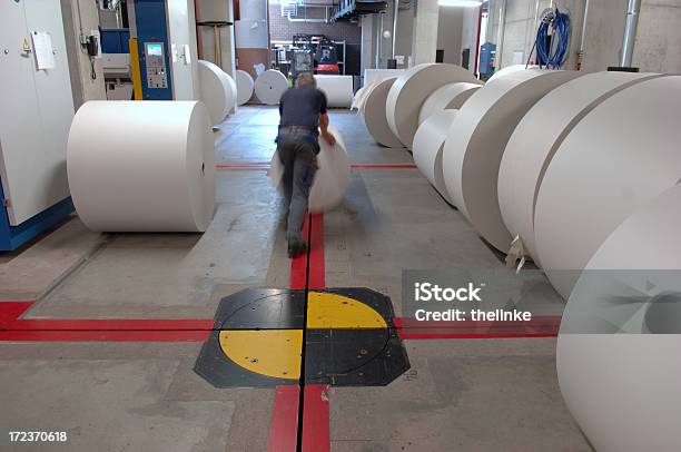 Man Working In A Printing Office 11 Stock Photo - Download Image Now - Magazine - Publication, Paper, Printing Plant