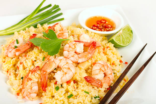 istock Asian Fried rice with shrimps with chopsticks 172371019