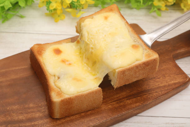 Toast with melted and stretched cheese