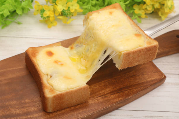 Toast with melted and stretched cheese