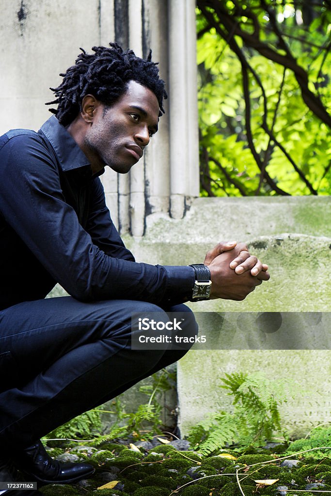 reconciled A mourner comes to terms with his grief. 20-24 Years Stock Photo