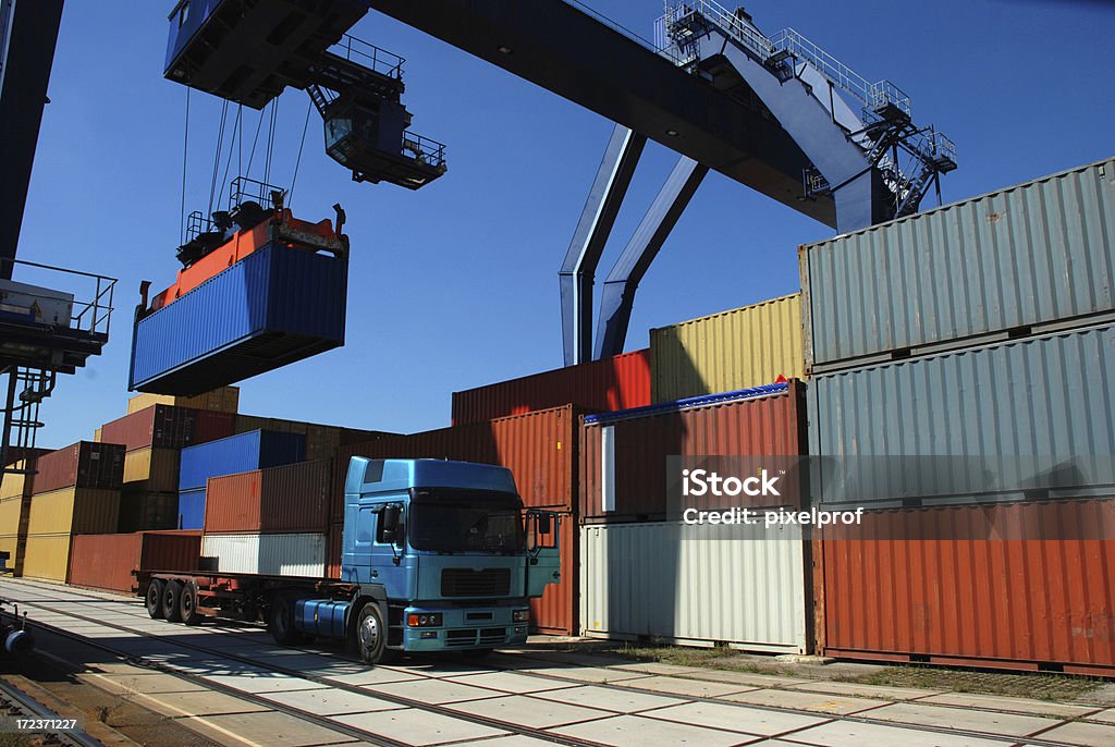Picking-up of containers Container terminal at river Rhine (Karlsruhe, Germany). Merchandise Stock Photo