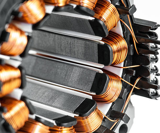 Electric motor stator winding and stack close-up stock photo
