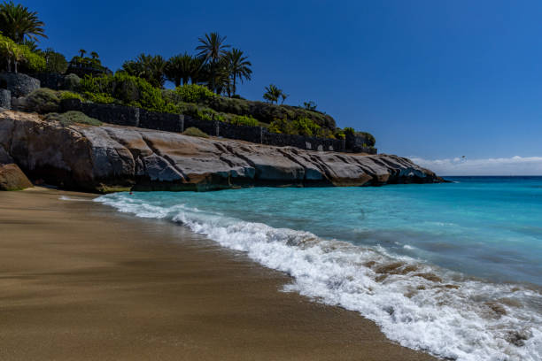 istock Sandy beaches of Costa Adeje Duque 1723718071