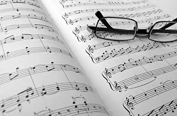 Photo of musical note and glasses