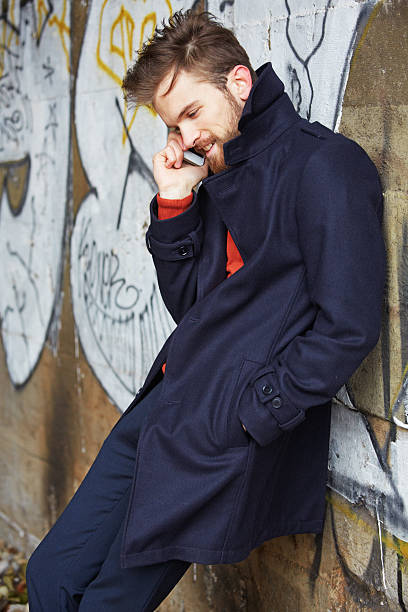 istock Fashionable Young Man Talking on Cellphone 172372294