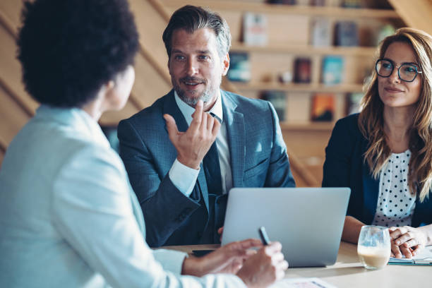 istock Group of entrepreneurs talking in the office 1723730036