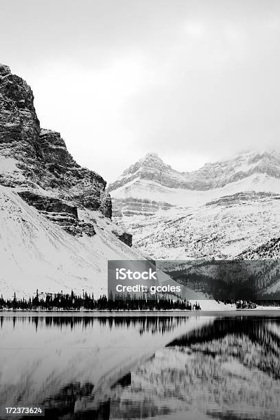 Winter Mountain Reflection Stock Photo - Download Image Now - Mountain, Black And White, Alberta